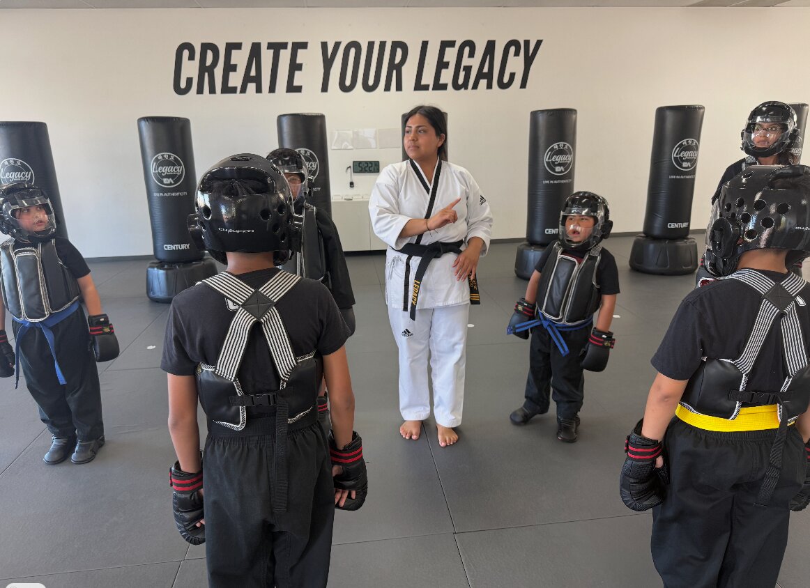 Instructor leading a youth class at Legacy Martial Arts